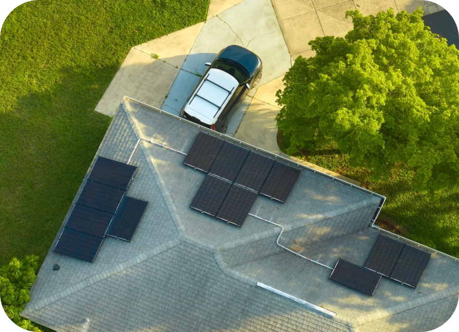 Overhead of house with panels and car
