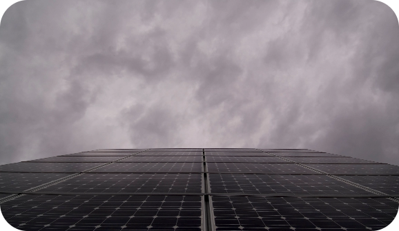 Vertical view of solar panels on an overcast day