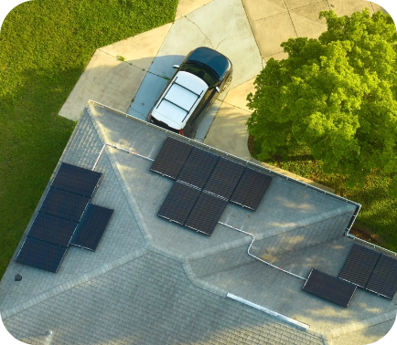 Birdseye view of solar panels on a roof