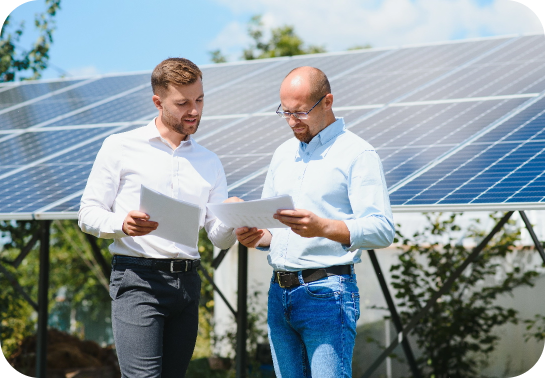 Two men discussing solar panels