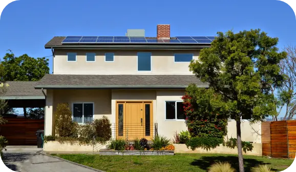 Two-story home with solar panels 