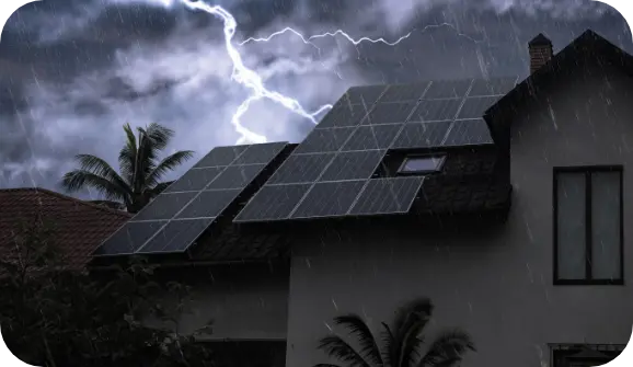 Solar panels silhouetted by lightning