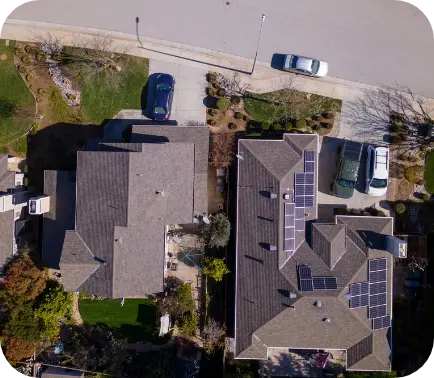 Birds eye view of home with solar panels 