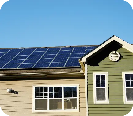 Solar panels on roof of paneled house