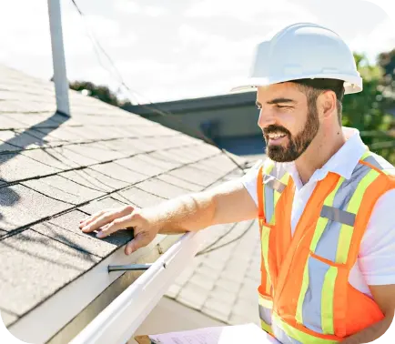 Smiling worker on roof 