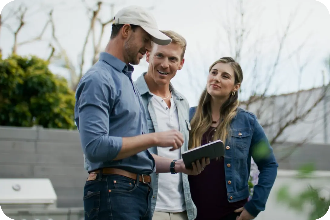 Contractor talking with couple